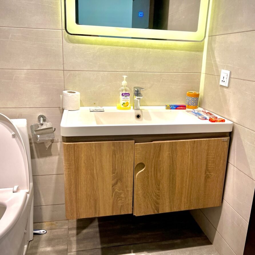 Modern luxury bathroom with glass shower in serviced apartment, Elysium Tower Islamabad near Centaurus Mall