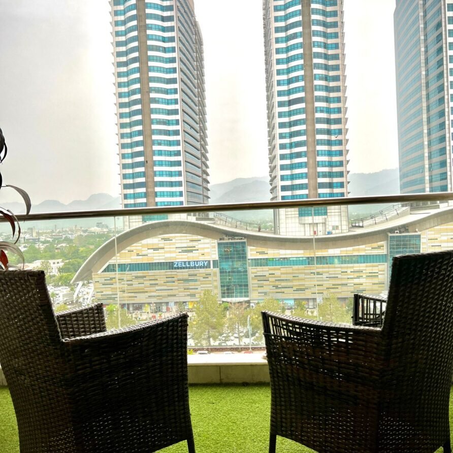 High-rise view of Centaurus and Islamabad skyline from Elysium serviced apartment balcony