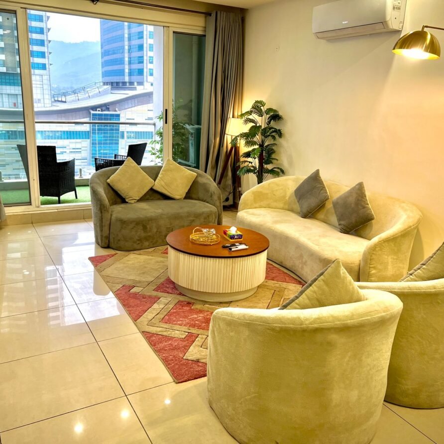 Sunlit lounge with Margalla Hills view in 2-bedroom rental apartment near Centaurus Mall Islamabad